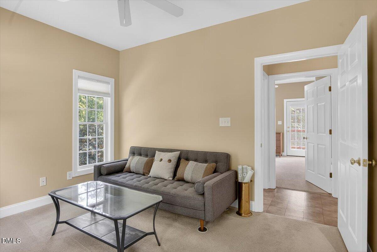 185 Joe Baldwin Road Leasburg, NC 27291 - Photo 19 of 95 a living room with furniture and a window