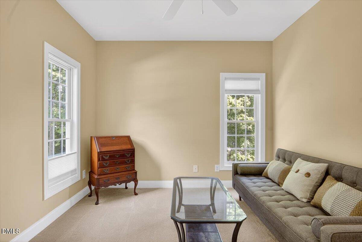 185 Joe Baldwin Road Leasburg, NC 27291 - Photo 20 of 95 a living room with furniture a window and a lamp