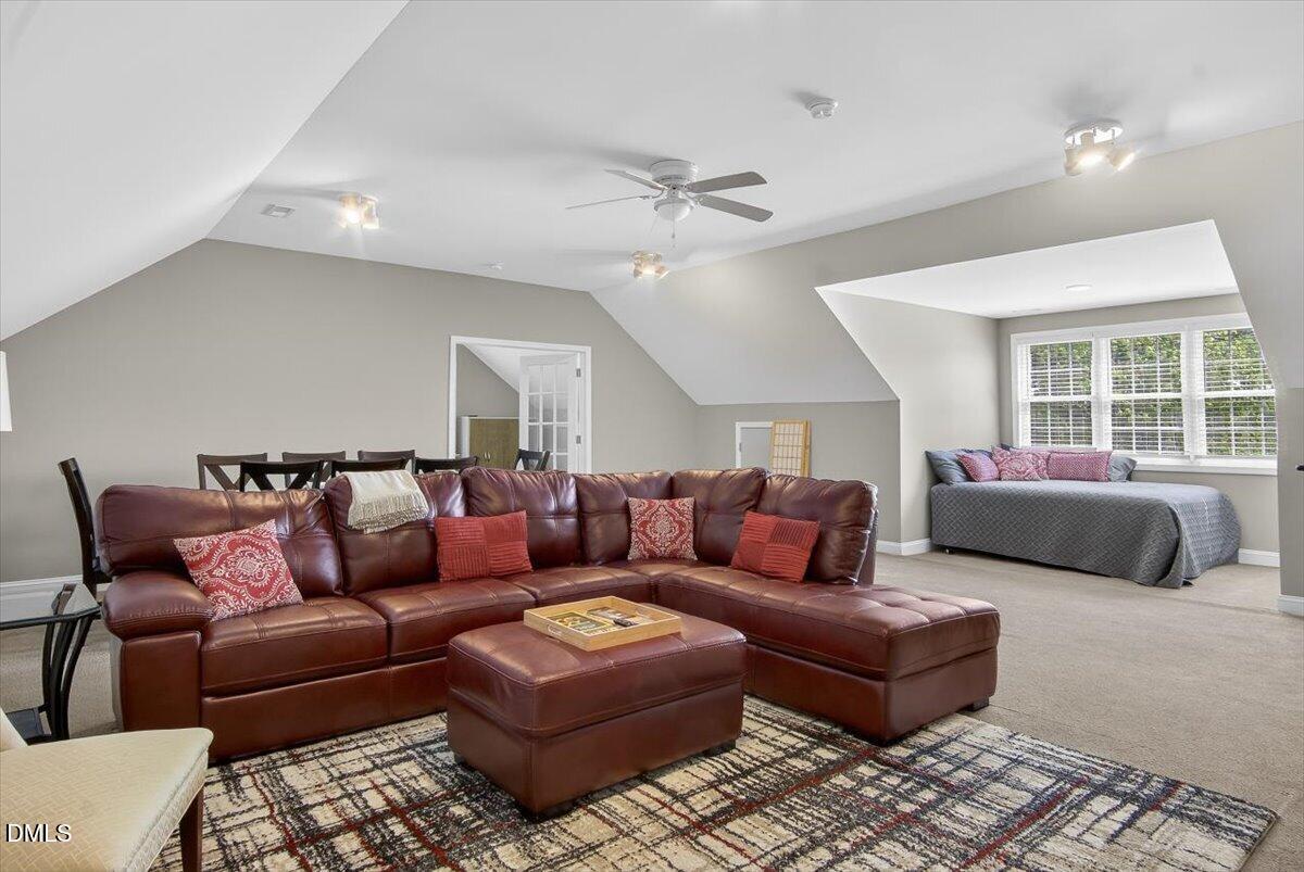 185 Joe Baldwin Road Leasburg, NC 27291 - Photo 43 of 95 a living room with furniture and a window