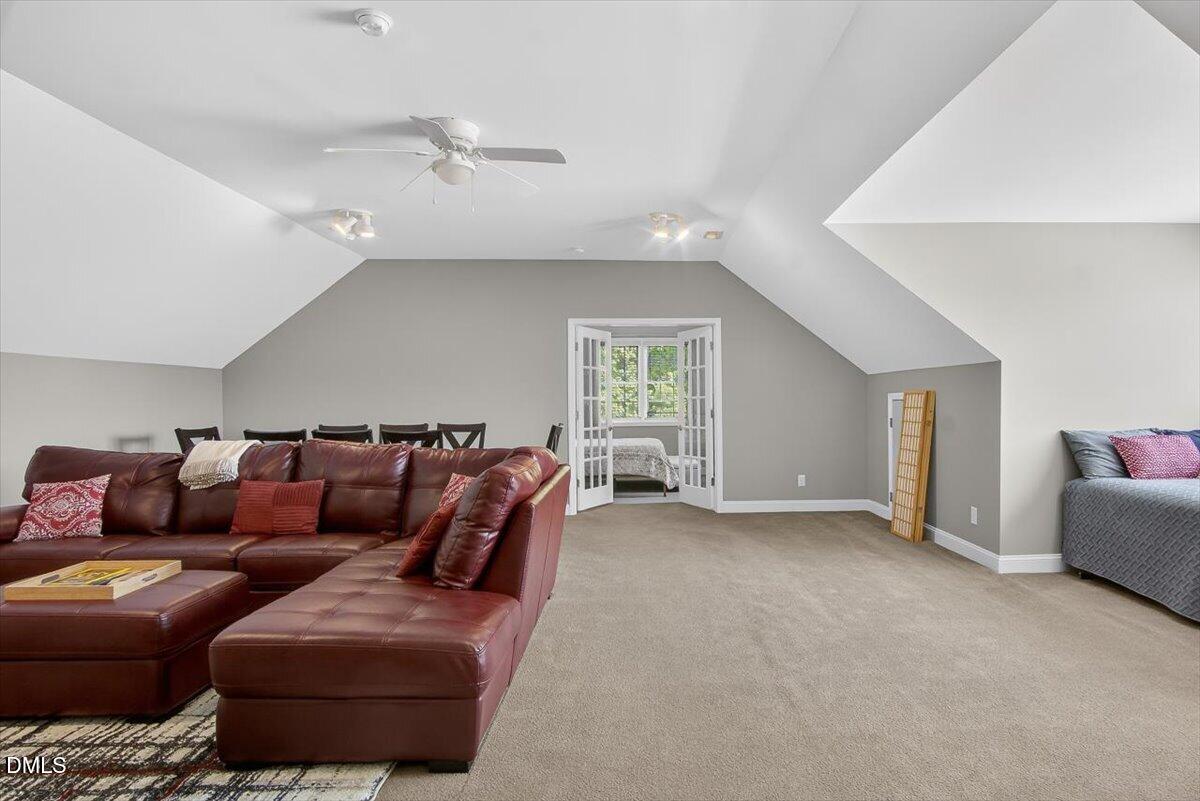 185 Joe Baldwin Road Leasburg, NC 27291 - Photo 45 of 95 a living room with furniture and a window