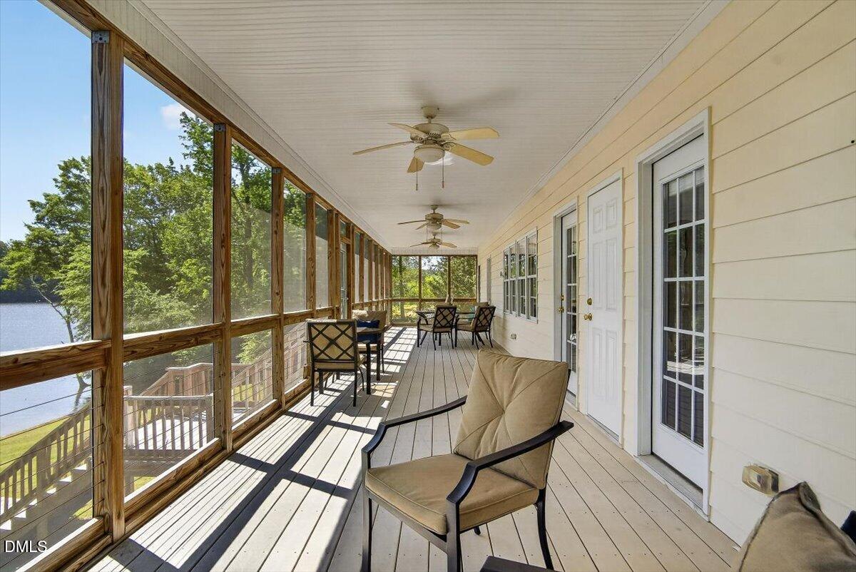 185 Joe Baldwin Road Leasburg, NC 27291 - Photo 59 of 95 a view of a dining room with furniture window and outside view