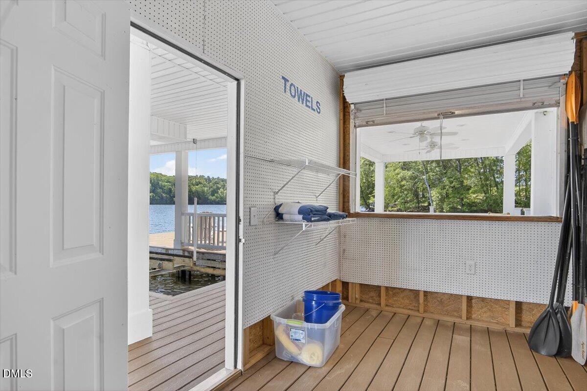 185 Joe Baldwin Road Leasburg, NC 27291 - Photo 83 of 95 a view of a room with wooden floor and outdoor space