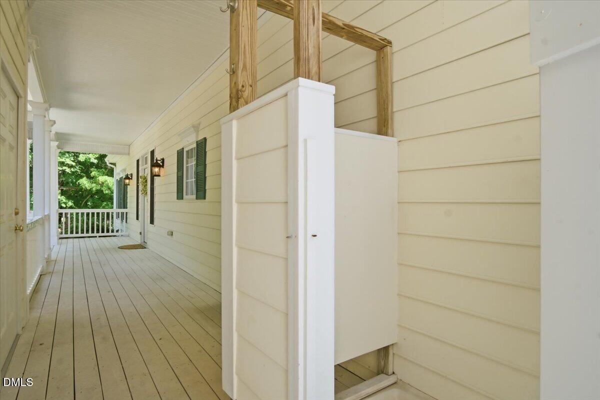 185 Joe Baldwin Road Leasburg, NC 27291 - Photo 91 of 95 a view of a house with a door
