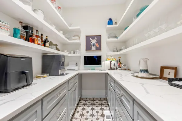 a kitchen with a sink and a window