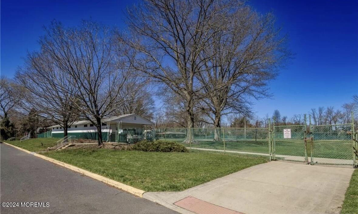 28 Manchester Court, Unit C Freehold, NJ 07728 - Photo 19 of 23 a view of a park with large trees