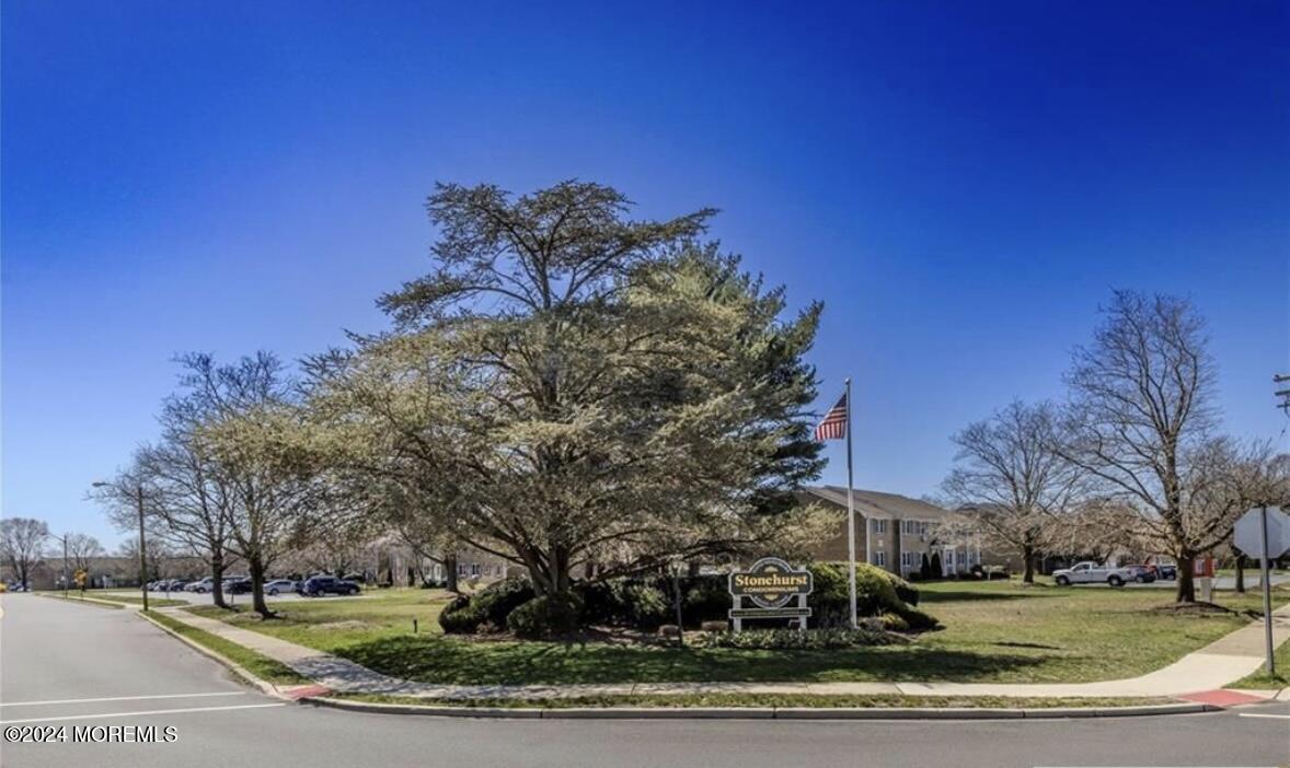 28 Manchester Court, Unit C Freehold, NJ 07728 - Photo 20 of 23 a view of a yard with large trees