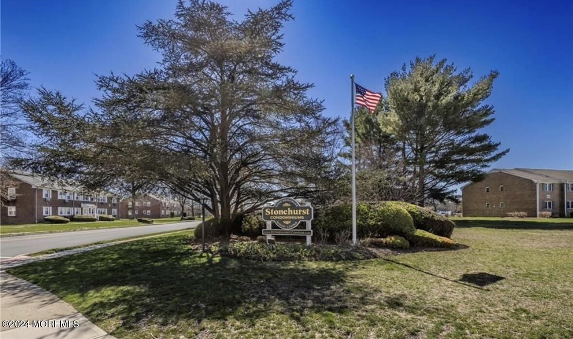 28 Manchester Court, Unit C Freehold, NJ 07728 - Photo 21 of 23 a backyard of a house with lots of green space