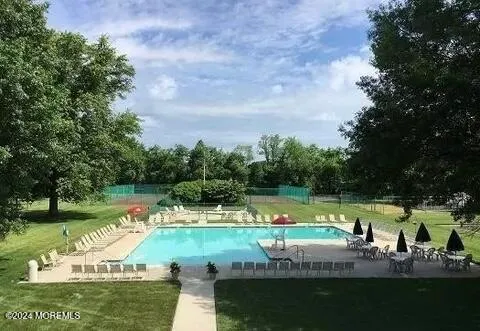 a view of a lake with a yard