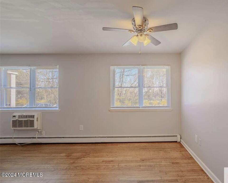 28 Manchester Court, Unit C Freehold, NJ 07728 - Photo 6 of 23 a view of an empty room with a window