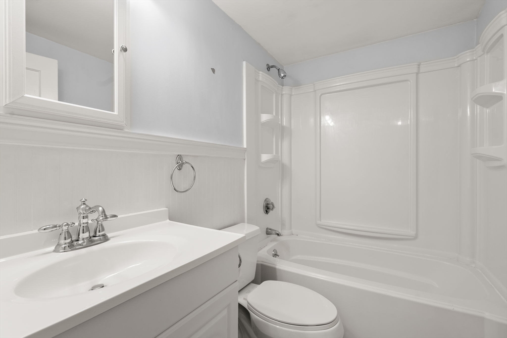 99 Proctor Road Braintree, MA 02184 - Photo 19 of 32 a bathroom with a sink toilet and shower