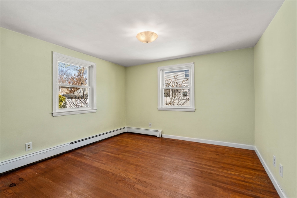 99 Proctor Road Braintree, MA 02184 - Photo 20 of 32 a view of a room with wooden floor and window