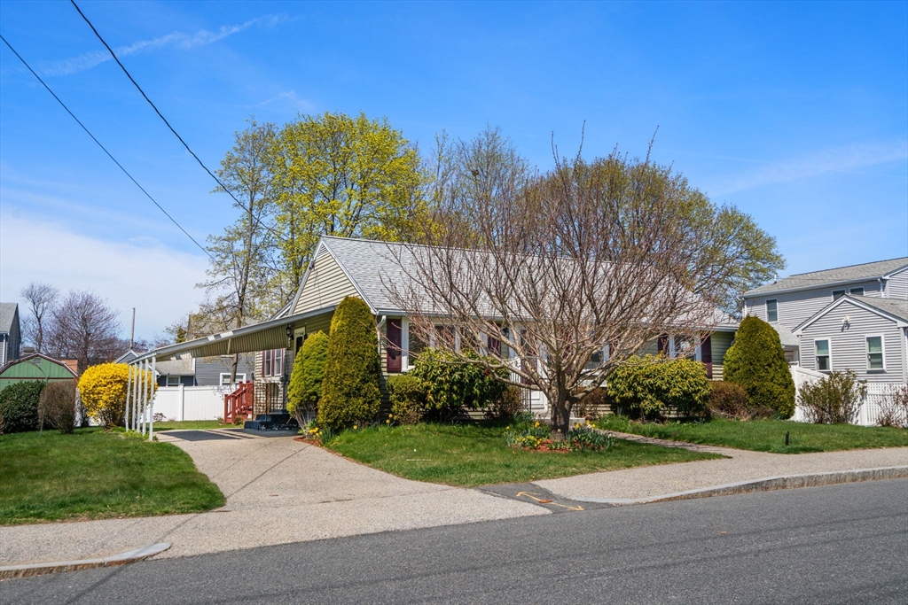 99 Proctor Road Braintree, MA 02184 - Photo 2 of 32 a view of a street in front of a building