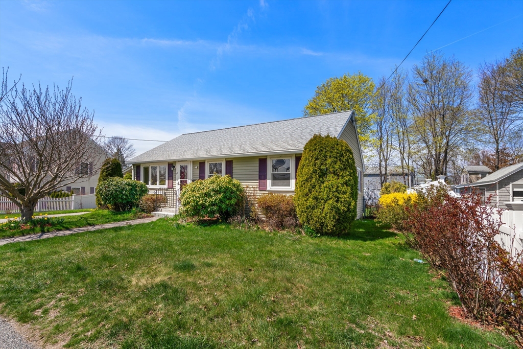 99 Proctor Road Braintree, MA 02184 - Photo 3 of 32 a view of a house with a backyard