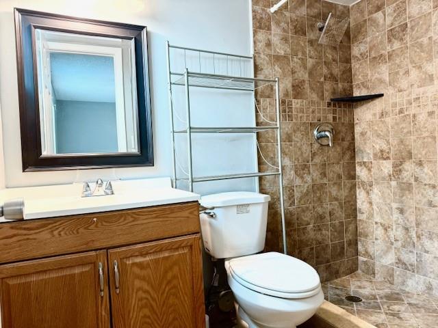 3110 North Pine Island Road, Unit 101 Sunrise, FL 33351 - Photo 10 of 14 a bathroom with a sink a toilet and shower