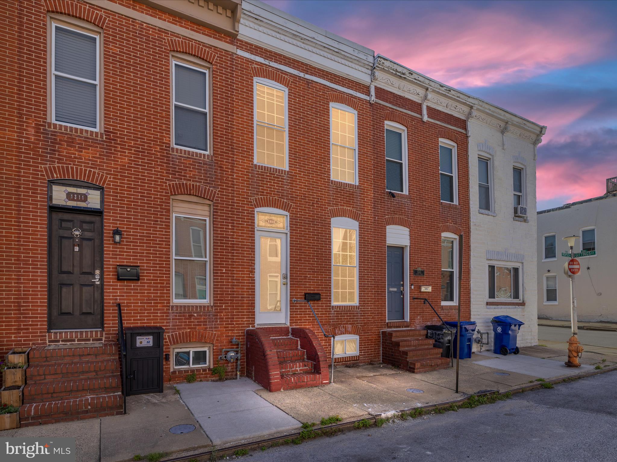 a building view with couple of chairs and tables