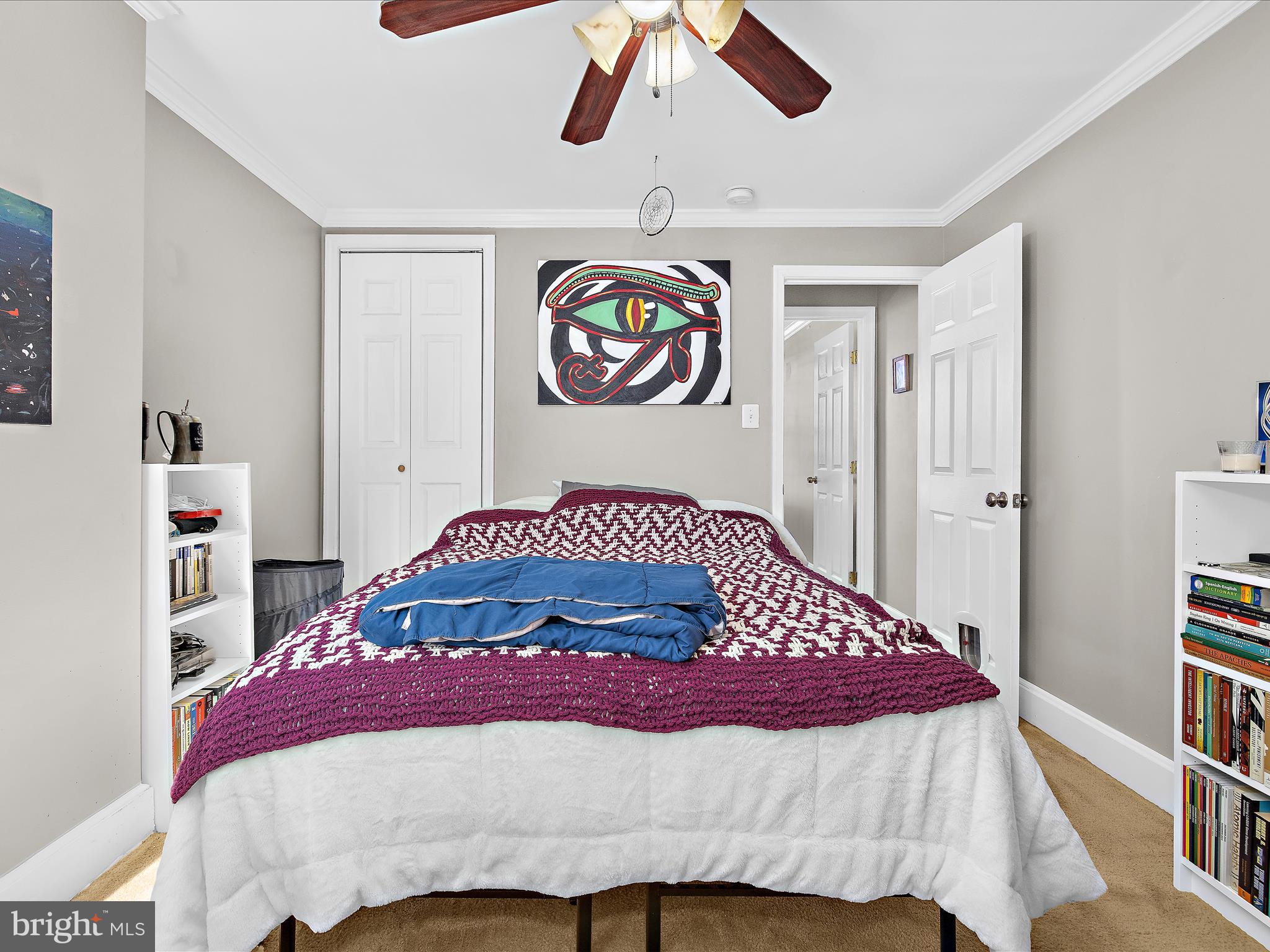 1313 Patapsco Street Baltimore, MD 21230 - Photo 15 of 30 a bedroom with a bed and painting on the wall