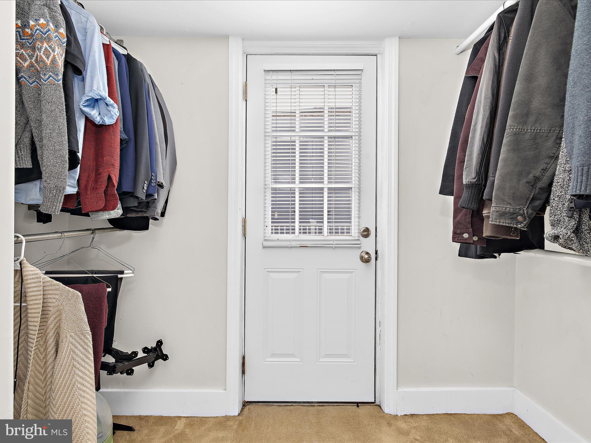 1313 Patapsco Street Baltimore, MD 21230 - Photo 20 of 30 a view of walk in closet with clothes and shoes