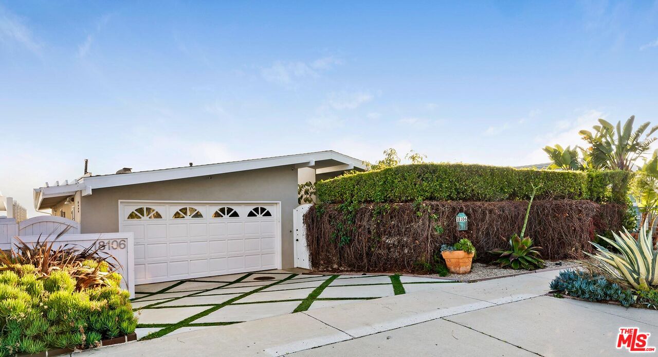 18106 Wakecrest Drive Malibu, CA 90265 - Photo 2 of 29 a front view of a house with garden