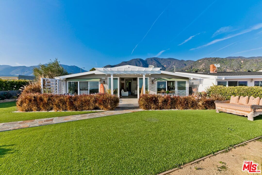 18106 Wakecrest Drive Malibu, CA 90265 - Photo 29 of 29 a front view of a house with a yard