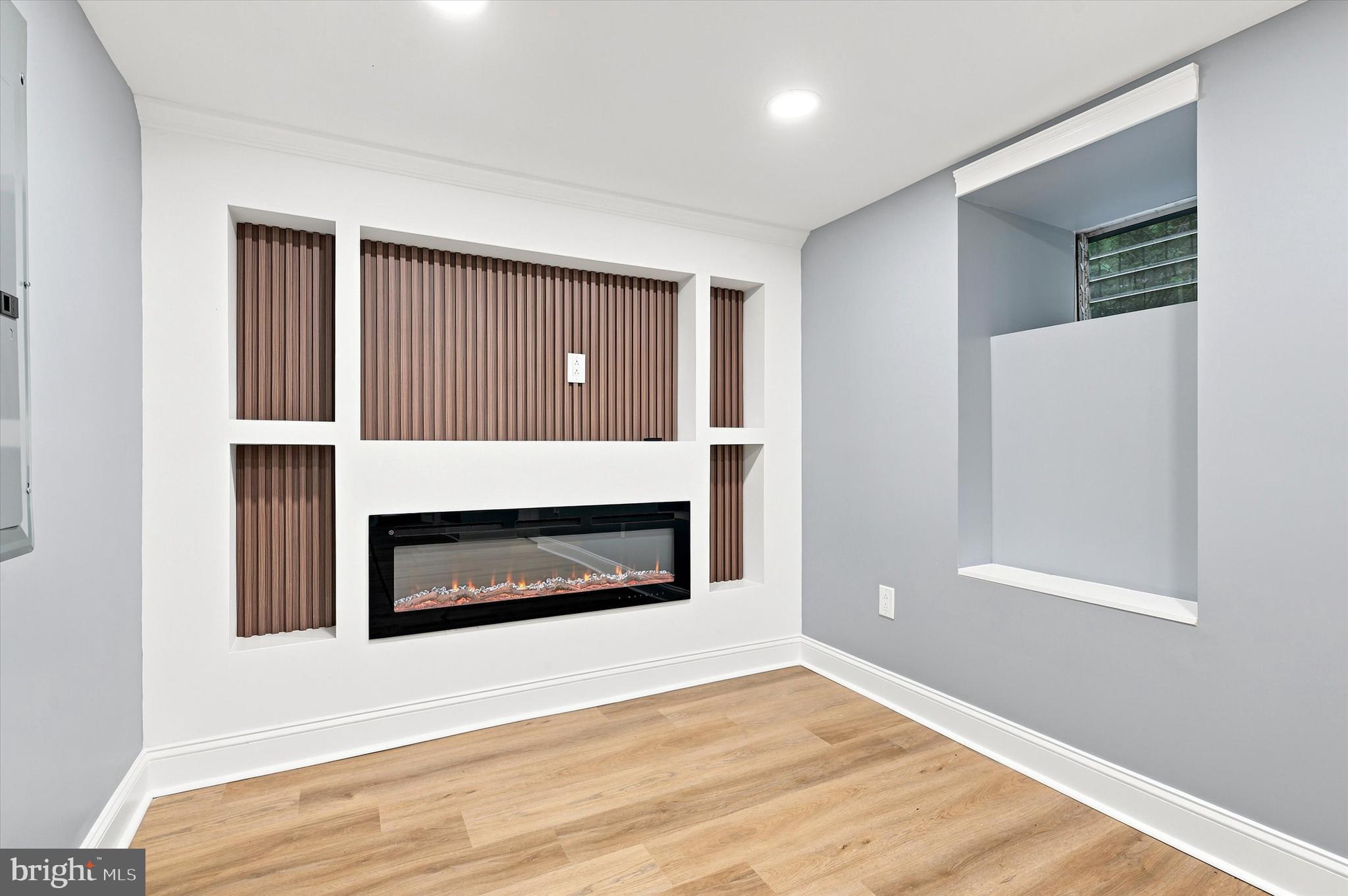 1620 South Yewdall Street Philadelphia, PA 19143 - Photo 32 of 38 a view of an empty room with wooden floor and a window