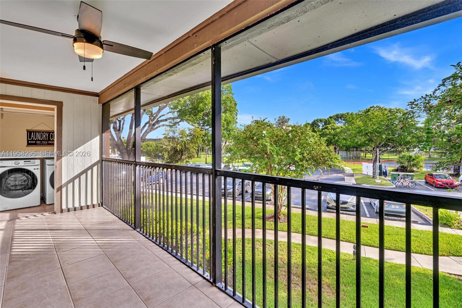 9487 West McNab Road, Unit 205 Tamarac, FL 33321 - Photo 24 of 44 a view of a balcony