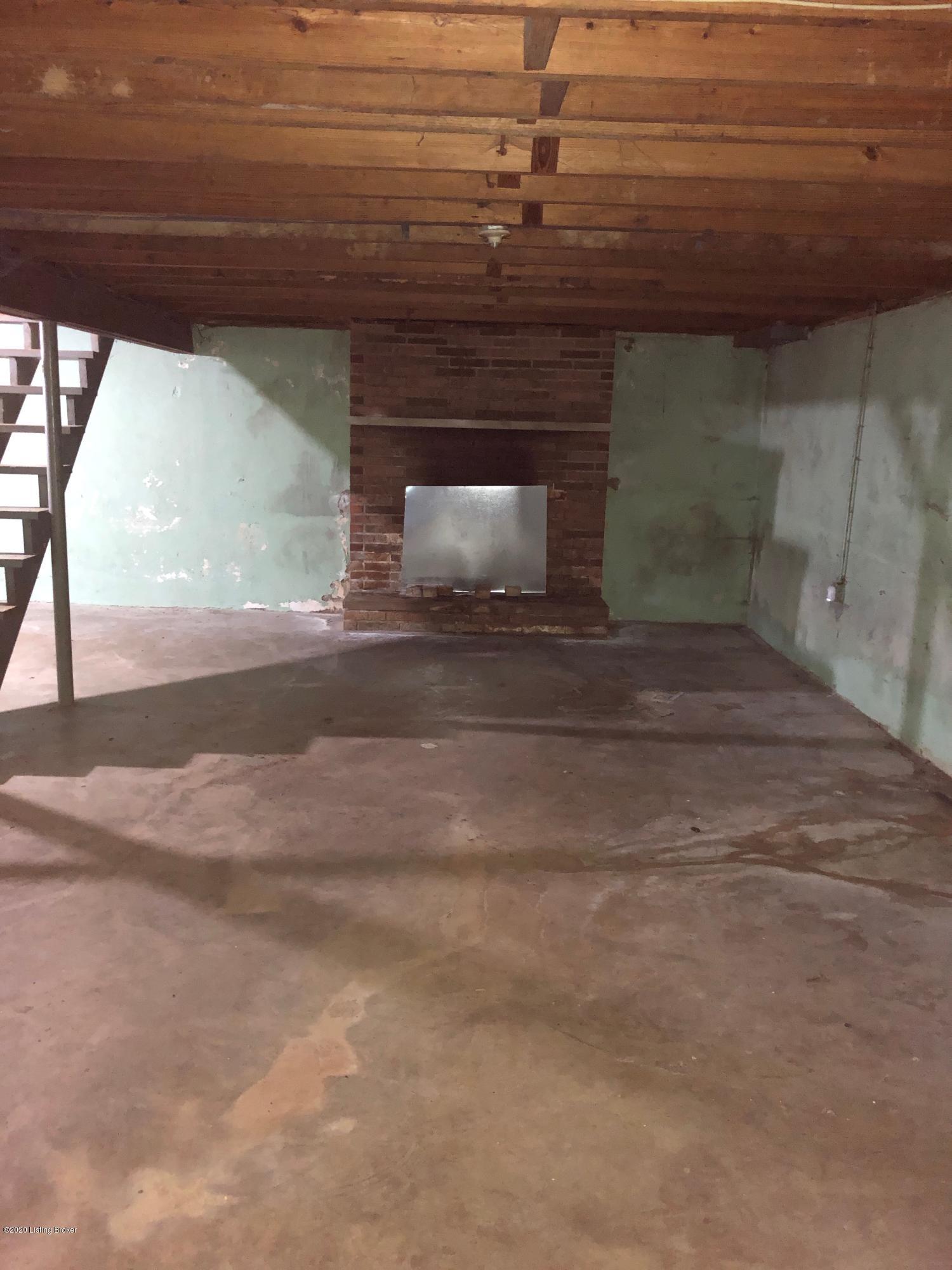 10810 Barricks Road Fairdale, KY 40118 - Photo 15 of 25 Fireplace in basement