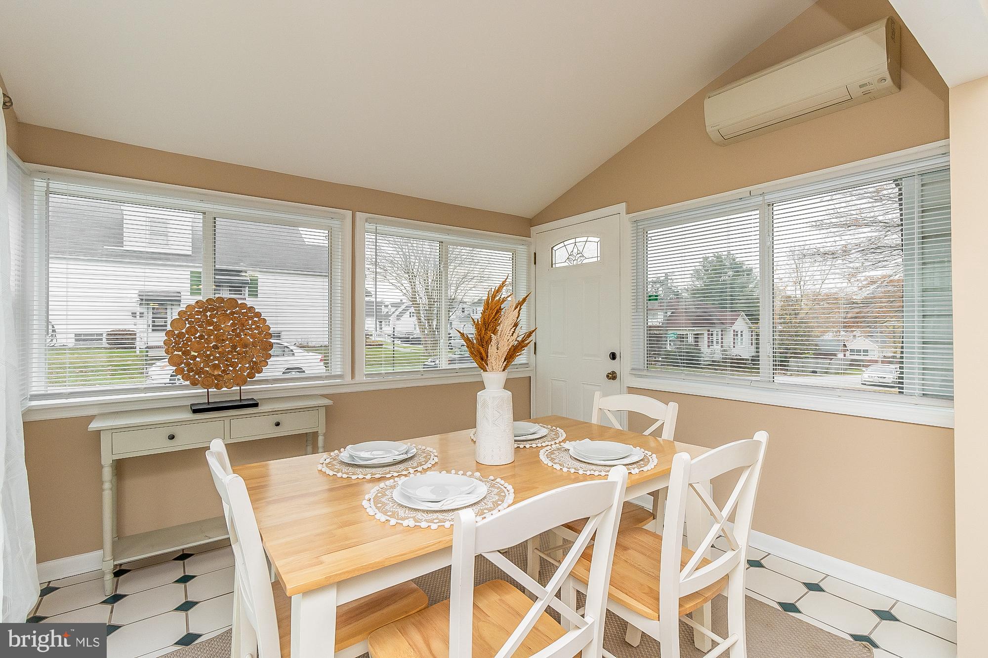 7501 Kenlea Avenue Nottingham, MD 21236 - Photo 18 of 55 a view of a dining room with furniture and wooden floor
