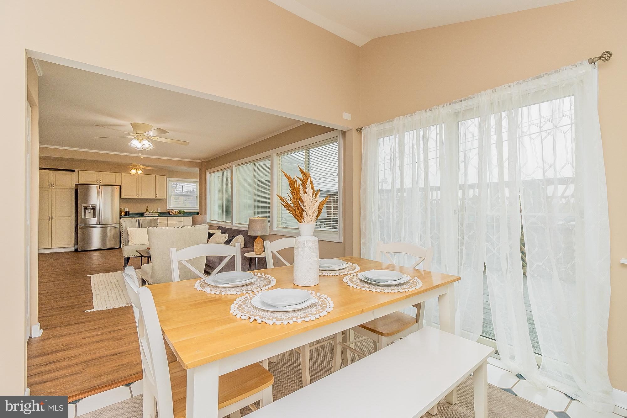 7501 Kenlea Avenue Nottingham, MD 21236 - Photo 21 of 55 a view of a dining room with furniture and wooden floor