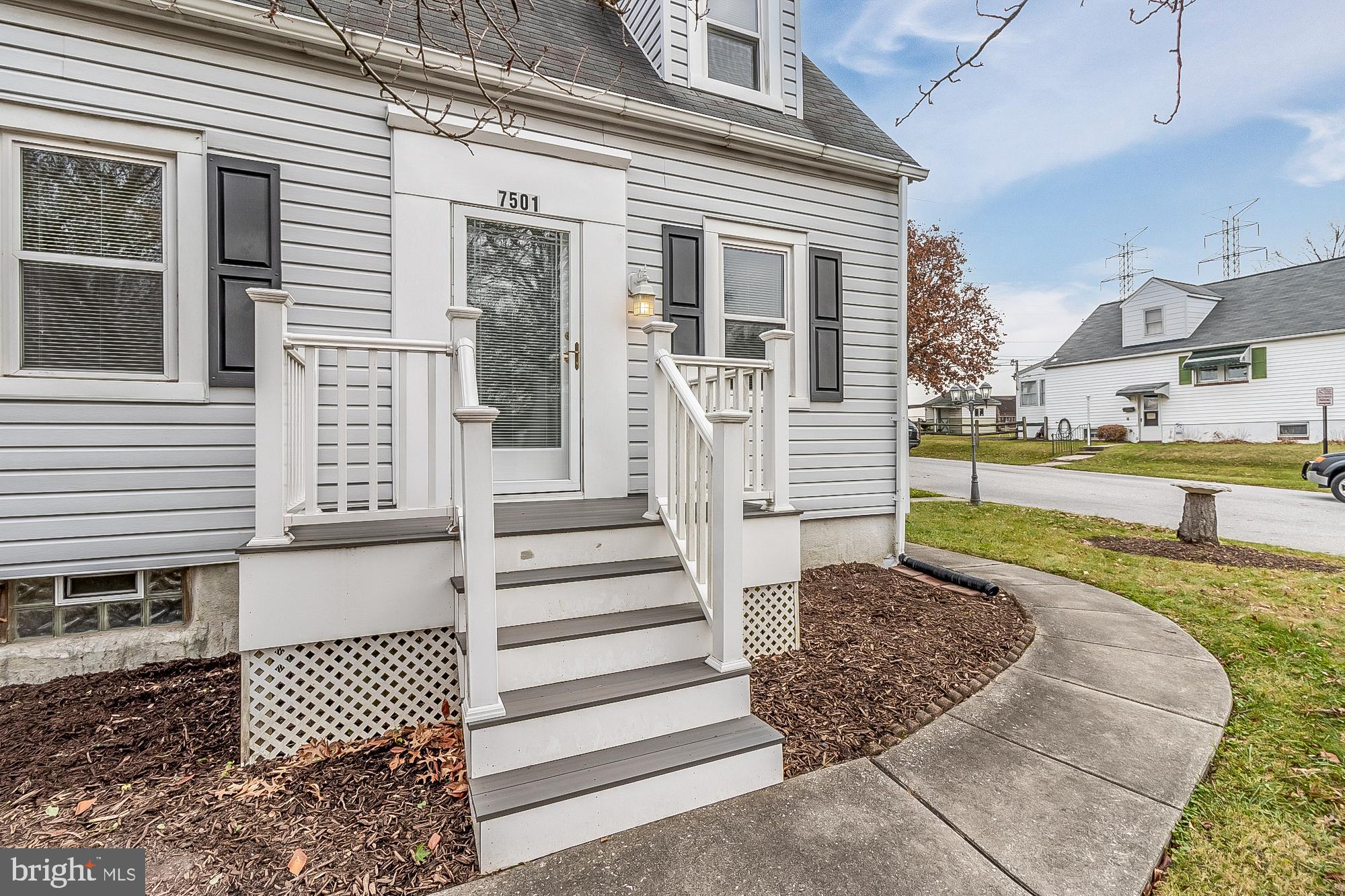 7501 Kenlea Avenue Nottingham, MD 21236 - Photo 4 of 55 a front view of a house with a yard