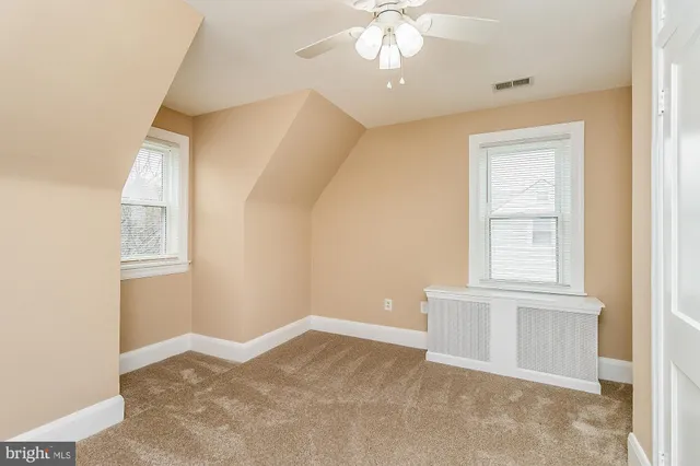 an empty room with a bathroom