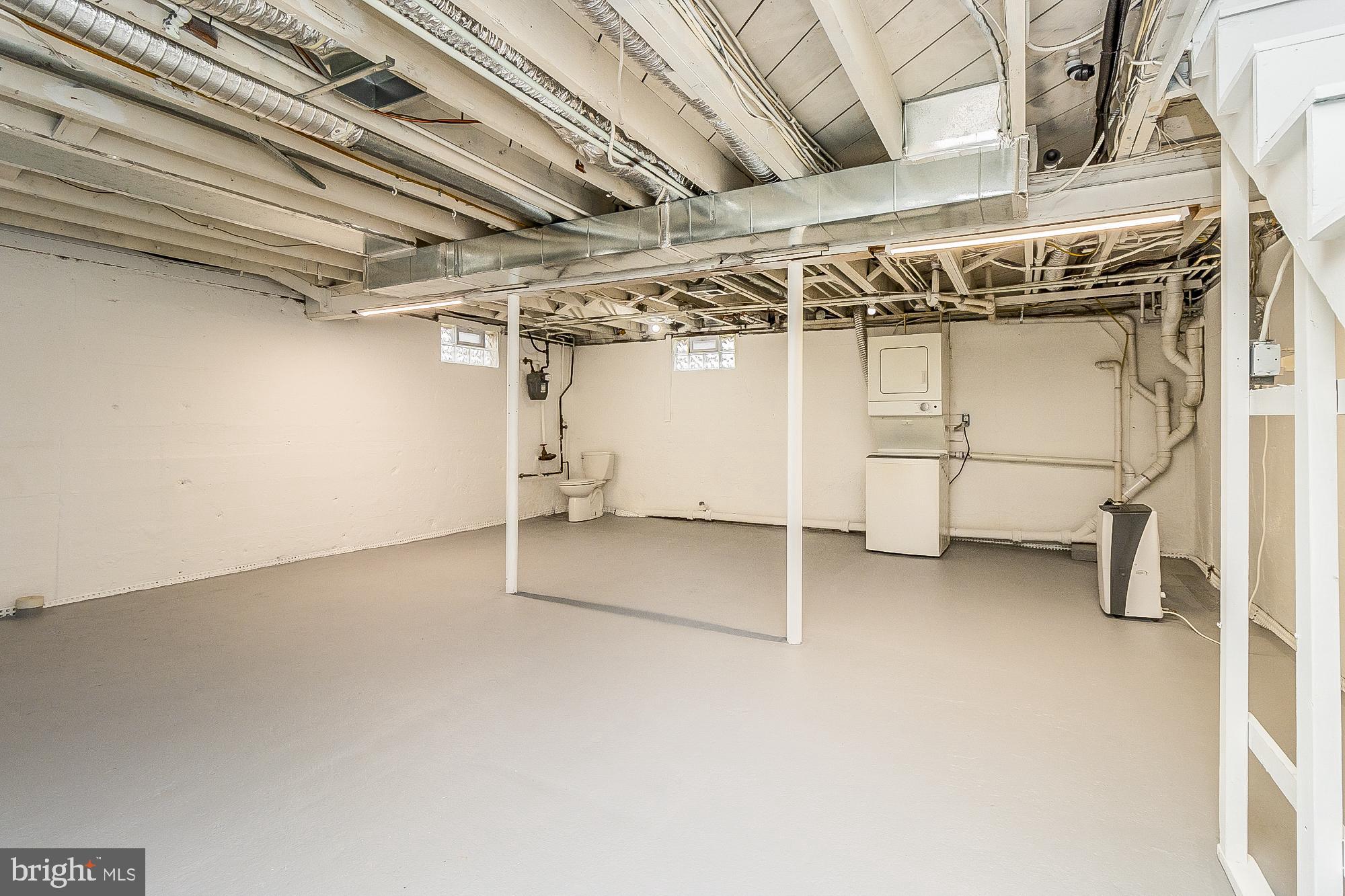 7501 Kenlea Avenue Nottingham, MD 21236 - Photo 44 of 55 a view of a room with storage and racks