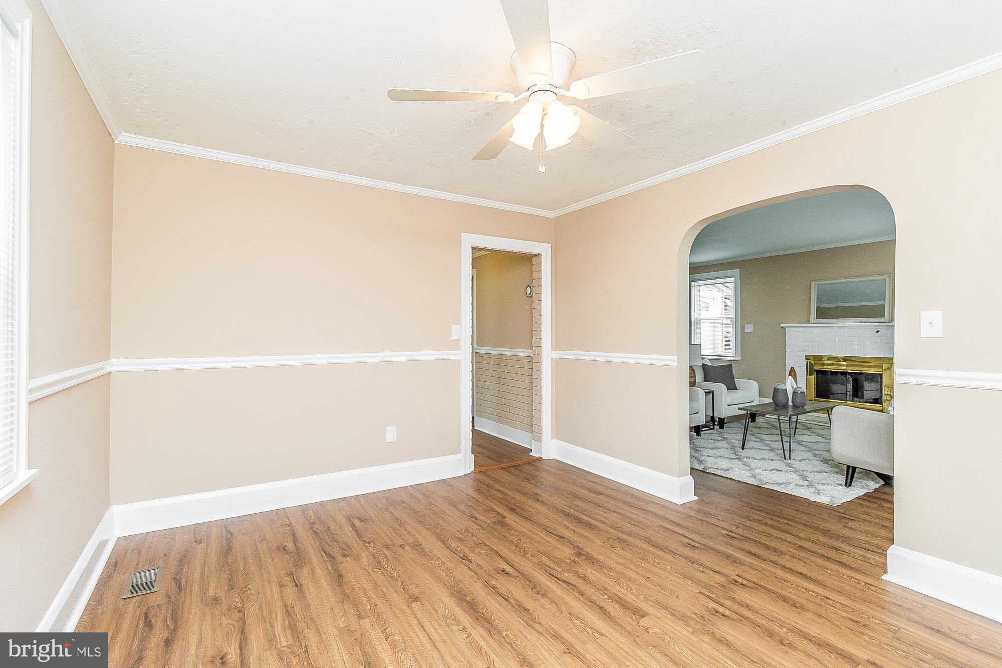 7501 Kenlea Avenue Nottingham, MD 21236 - Photo 9 of 55 wooden floor in an empty room with a window