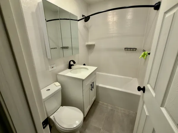 a view of a chairs and tables in the patio