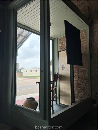 a table with chairs and a stove