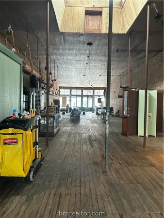 a view of a swimming pool with a chairs