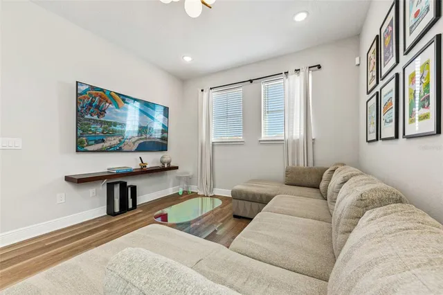 a kitchen with stainless steel appliances granite countertop a sink and a stove