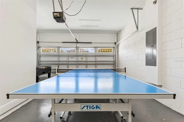 a view of a room with furniture and window