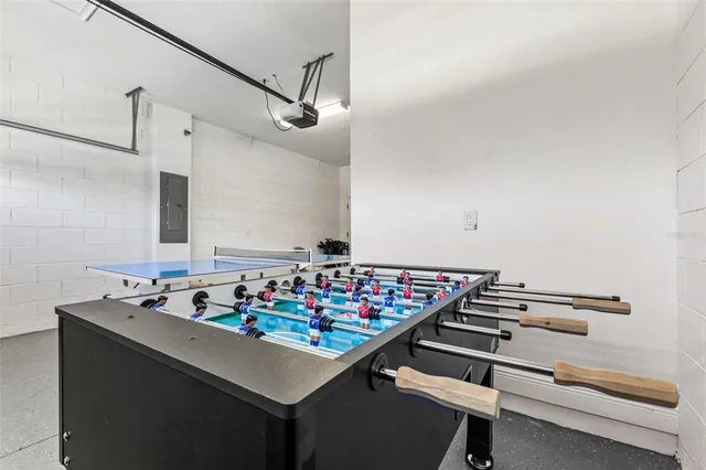 a view of a swimming pool with an outdoor seating and a yard