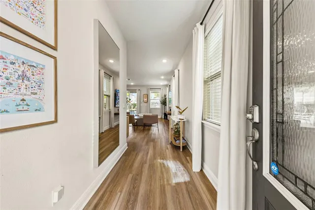 a view of a swimming pool with an outdoor seating and a yard