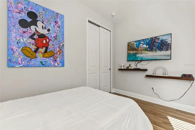 a bathroom with double vanity sink and mirror