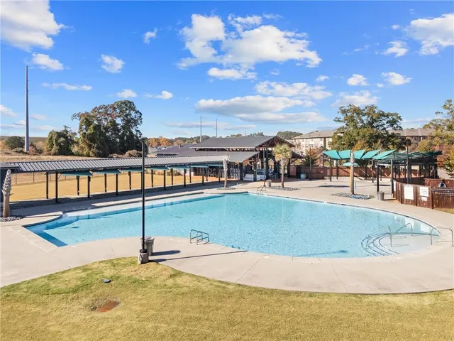 a view of a swimming pool and lake