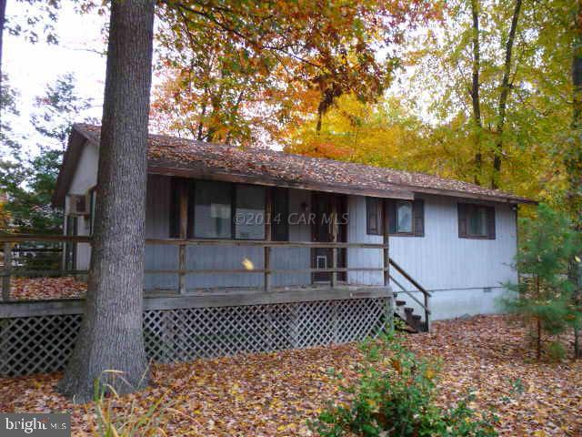 213 Windjammer Road Berlin, MD 21811 - Photo 1 of 10 a front view of a house with a yard