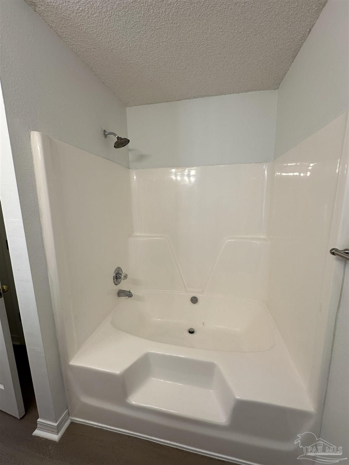 7959 Cayenne Way Pensacola, FL 32526 - Photo 11 of 19 a bathroom with a bathtub
