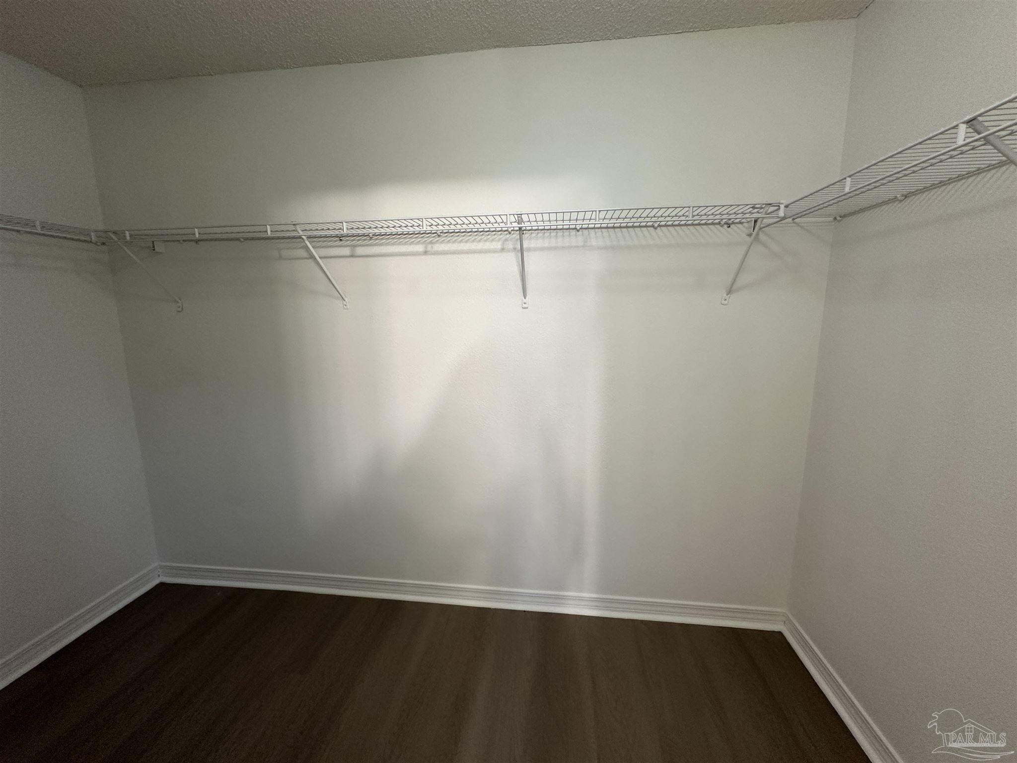 7959 Cayenne Way Pensacola, FL 32526 - Photo 12 of 19 a view of an empty walk in closet