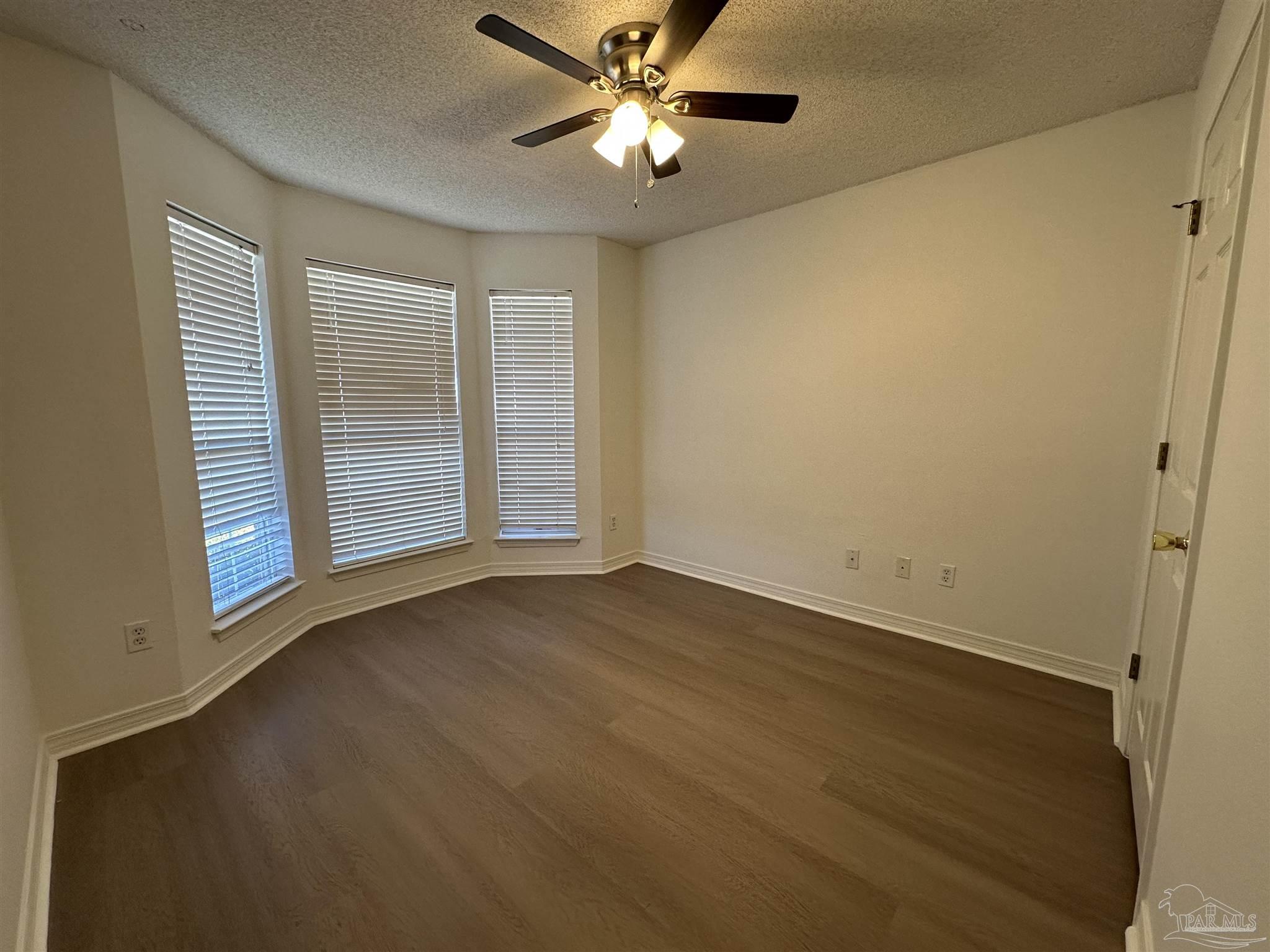 7959 Cayenne Way Pensacola, FL 32526 - Photo 16 of 19 a view of an empty room with a window