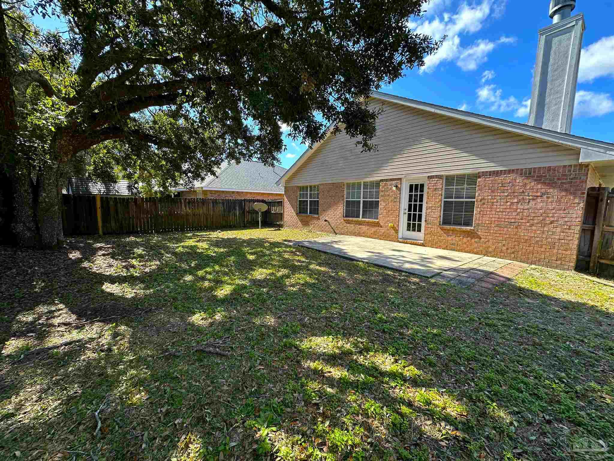 7959 Cayenne Way Pensacola, FL 32526 - Photo 19 of 19 a view of a house with a yard