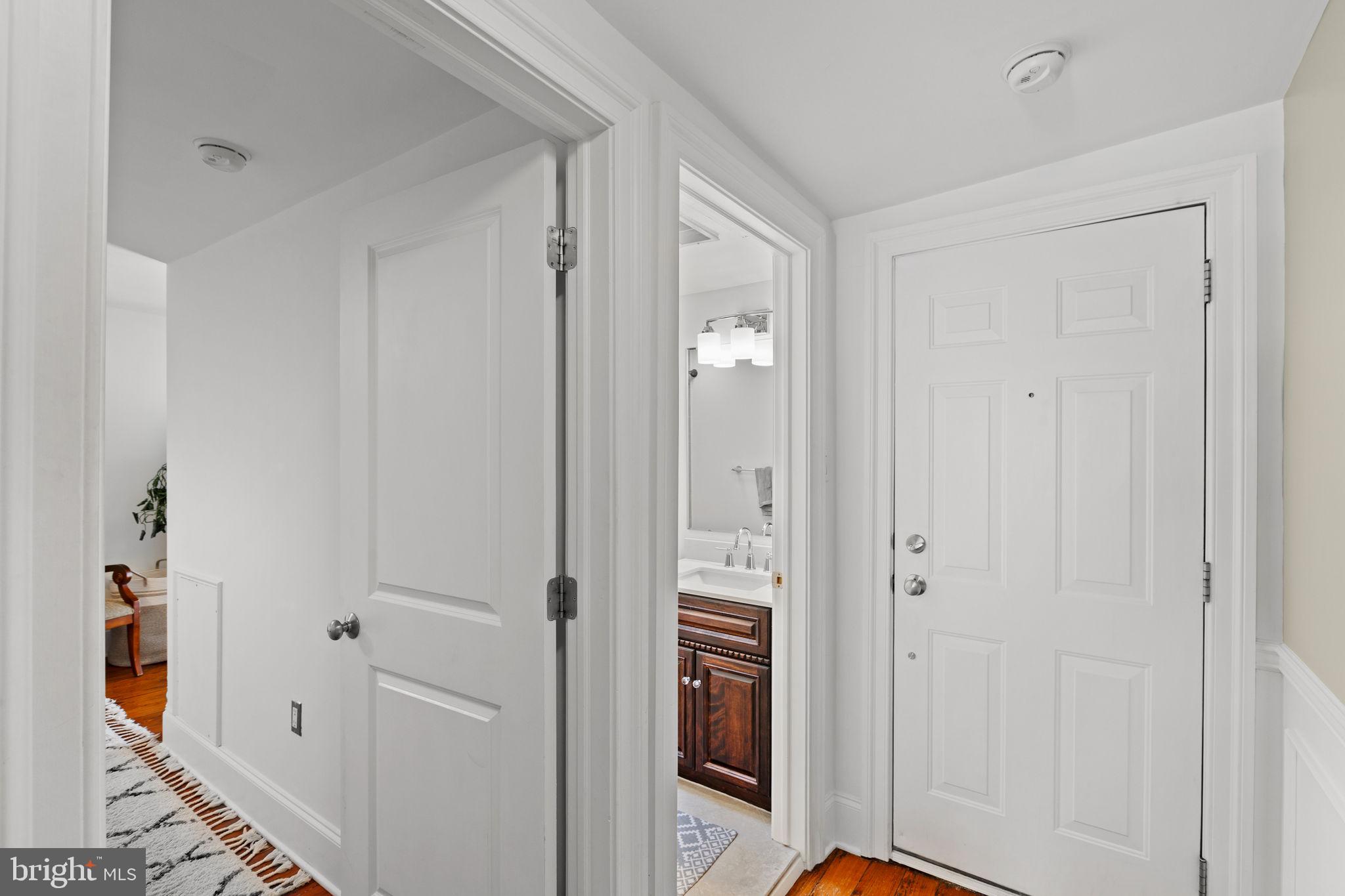 1708 Pine Street, Unit 4F Philadelphia, PA 19103 - Photo 12 of 16 a view of a bathroom with a sink and mirror