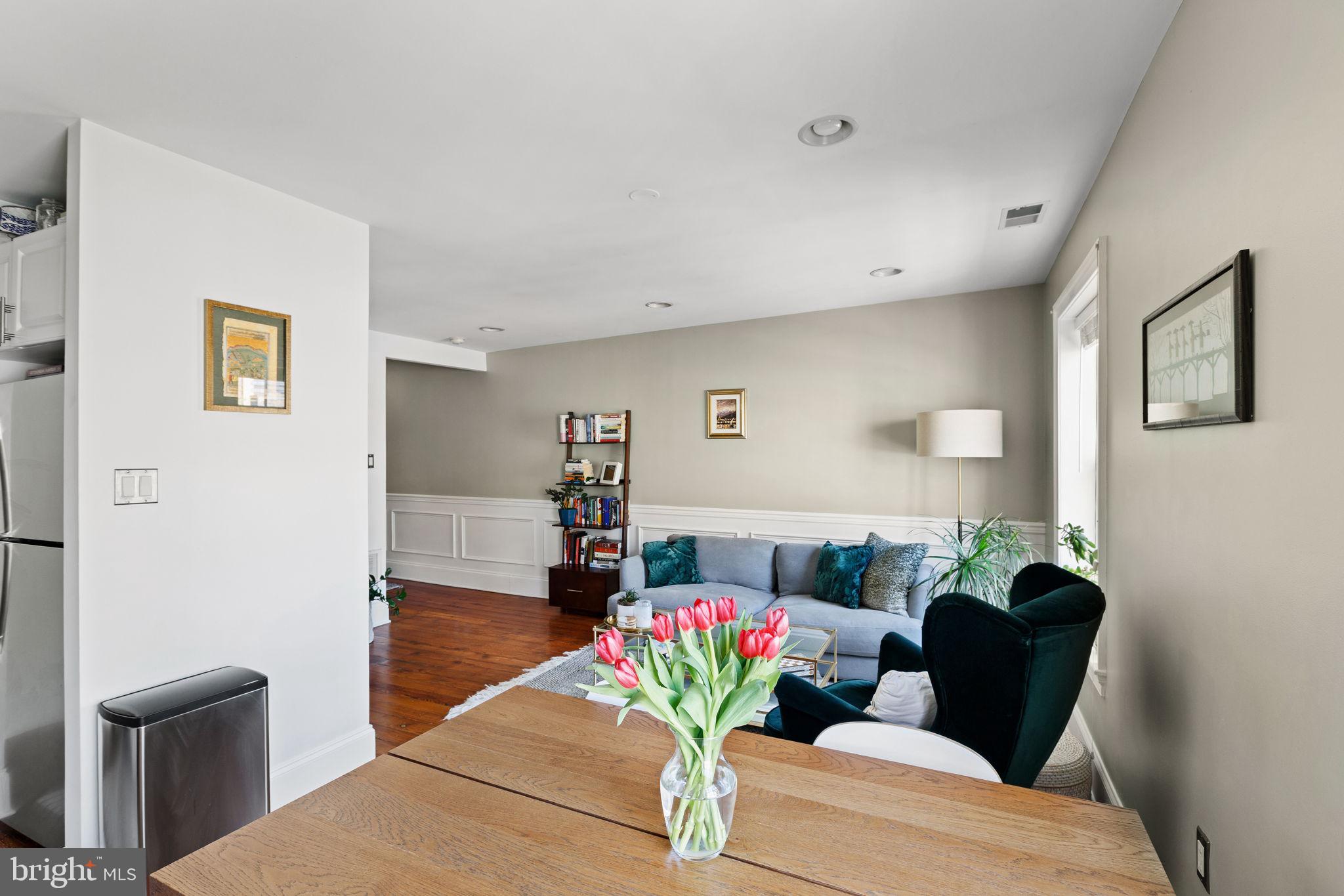 1708 Pine Street, Unit 4F Philadelphia, PA 19103 - Photo 4 of 16 a living room with furniture flowerpot and a potted plant