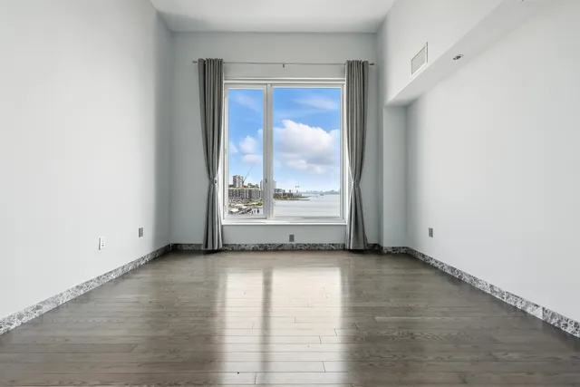 a view of a lake from a balcony