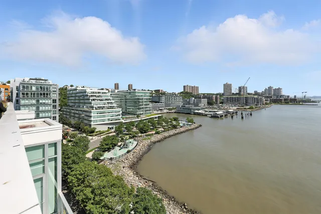 a view of a building with a street